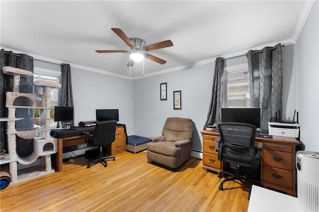15 Wayland St, East Providence, RI 02914 - home office with a ceiling fan, a baseboard heating unit, wood finished floors, and crown molding