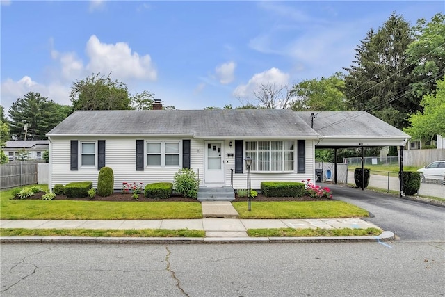 37 Joseph St, Providence, RI 02904 - ranch-style home featuring a chimney, a carport, and driveway