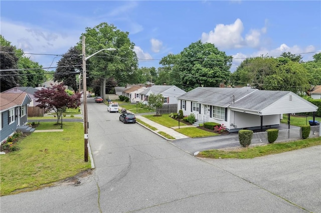 37 Joseph St, Providence, RI 02904 - view of front of home with a front yard, a residential view, and asphalt driveway