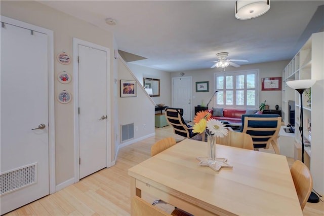 3399 Post Rd Unit 4, Warwick, RI 02886 - dining space with ceiling fan and light wood-style flooring