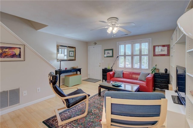 3399 Post Rd Unit 4, Warwick, RI 02886 - living area with wood finished floors and a ceiling fan