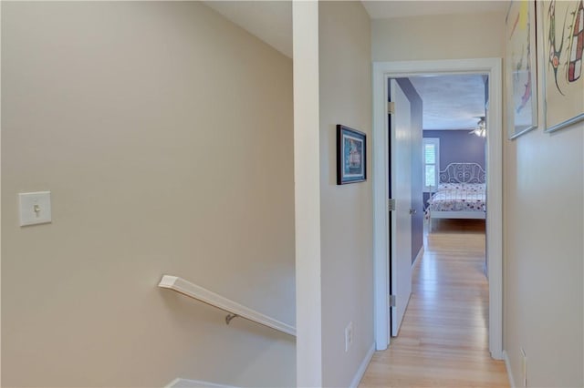 3399 Post Rd Unit 4, Warwick, RI 02886 - corridor featuring light wood-type flooring and an upstairs landing