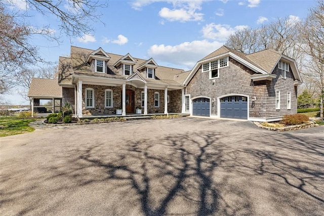 7 Spring Pond Rd, Westerly, RI 02891 - shingle-style home with a porch, driveway, and a garage