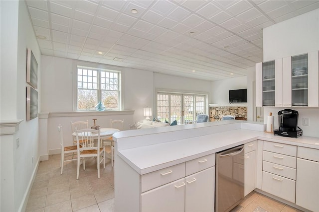 7 Spring Pond Rd, Westerly, RI 02891 - kitchen with dishwasher, a peninsula, light tile patterned floors, and light countertops