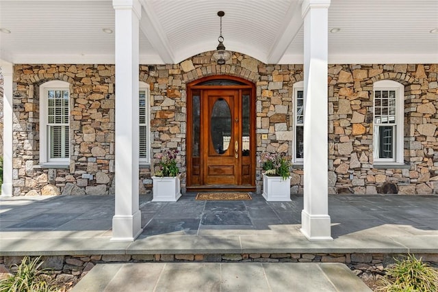 7 Spring Pond Rd, Westerly, RI 02891 - property entrance featuring stone siding and a porch