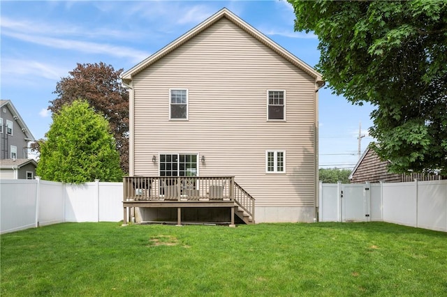 3560 Diamond Hill Rd, Cumberland, RI 02864 - back of house with a fenced backyard and a deck