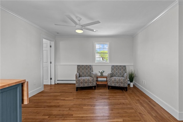 621 Thames St Unit C, Newport, RI 02840 - sitting room featuring baseboard heating, wood finished floors, ornamental molding, and a ceiling fan