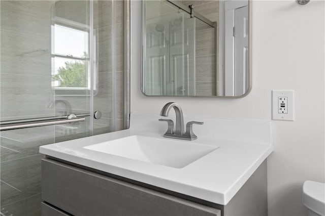 621 Thames St Unit C, Newport, RI 02840 - bathroom featuring vanity and a shower with door