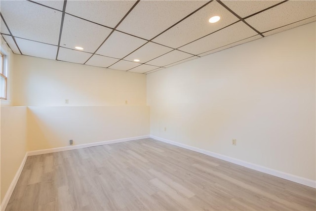 22 Gage St Unit 101, Providence, RI 02909 - unfurnished room featuring a paneled ceiling, wood finished floors, and recessed lighting