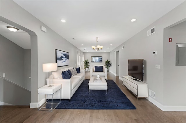 6 Jupiter Ln Unit B, Richmond, RI 02898 - living area featuring wood finished floors, electric panel, a chandelier, and recessed lighting