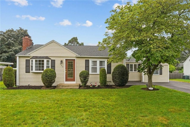 509 Buttonwoods Ave, Warwick, RI 02886 - view of front of property featuring a chimney and a shingled roof