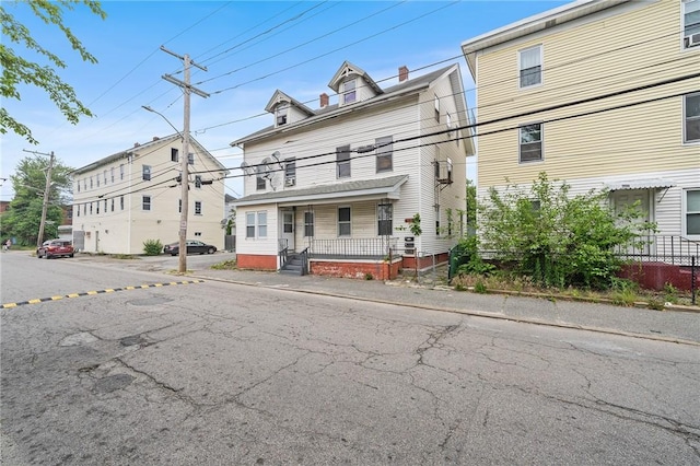 423 Pine St, Central Falls, RI 02863 - view of property featuring a porch