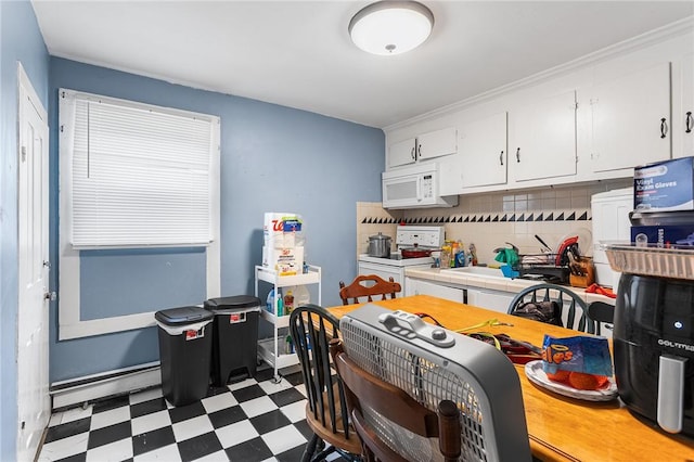 9 Nickerson St, Pawtucket, RI 02860 - kitchen with white appliances, tile patterned floors, tile counters, tasteful backsplash, and white cabinets