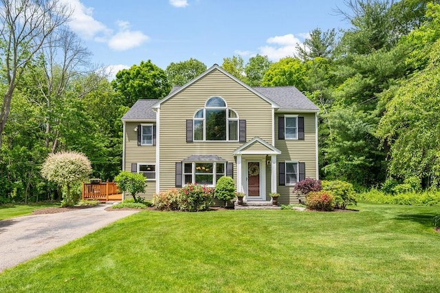 2470 W St, Wrentham, MA 02093 - colonial home featuring a front yard and a wooden deck