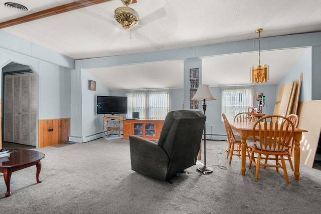 29 Cantaberry Ln, Coventry, RI 02816 - carpeted living room with plenty of natural light, a baseboard heating unit, a chandelier, and wainscoting