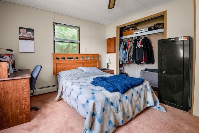 29 Cantaberry Ln, Coventry, RI 02816 - bedroom with a baseboard radiator, carpet floors, a closet, and a ceiling fan