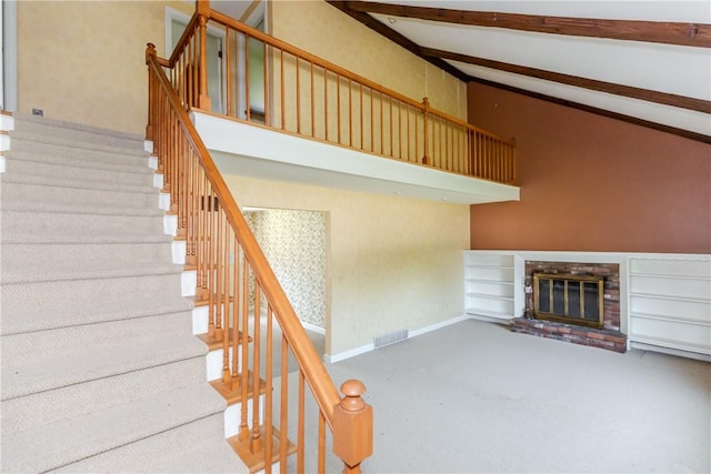14 Meadow View Dr, Smithfield, RI 02917 - stairway with carpet, beamed ceiling, a brick fireplace, and high vaulted ceiling