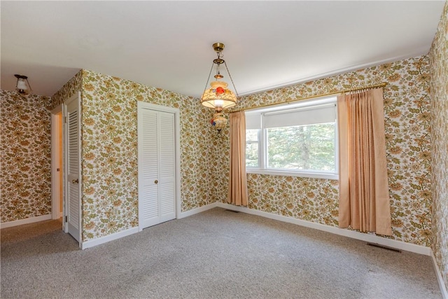 14 Meadow View Dr, Smithfield, RI 02917 - unfurnished dining area featuring carpet floors and wallpapered walls