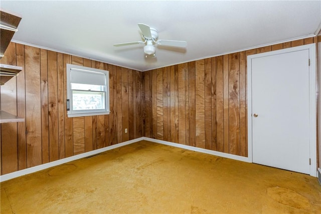 14 Meadow View Dr, Smithfield, RI 02917 - spare room with carpet, wood walls, and ceiling fan