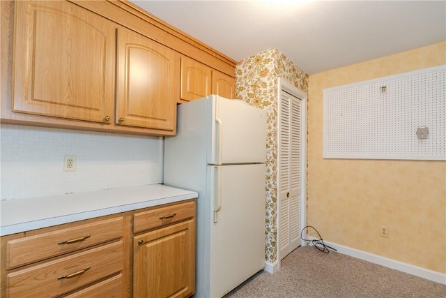 14 Meadow View Dr, Smithfield, RI 02917 - kitchen with freestanding refrigerator, light carpet, and light countertops