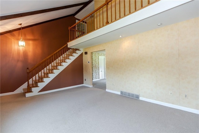 14 Meadow View Dr, Smithfield, RI 02917 - stairs with beam ceiling, carpet floors, and high vaulted ceiling