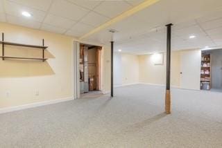 154 Bear Hill Rd Unit 303, Cumberland, RI 02864 - finished basement featuring a paneled ceiling and baseboards