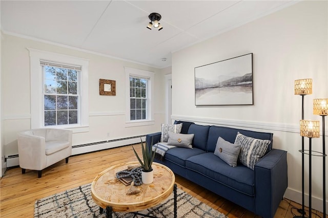 43 Cherry Ln Unit B, South Kingstown, RI 02879 - living room featuring a baseboard radiator, wood-type flooring, and crown molding