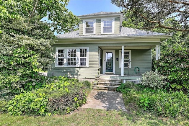129 Ash St, Warwick, RI 02888 - view of front of home with a porch and a shingled roof