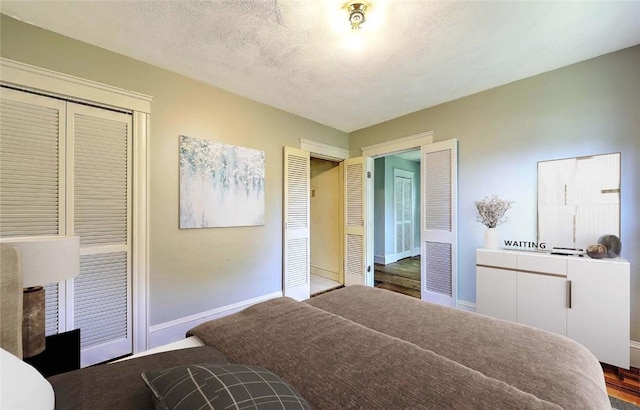 129 Ash St, Warwick, RI 02888 - bedroom with baseboards and wood finished floors