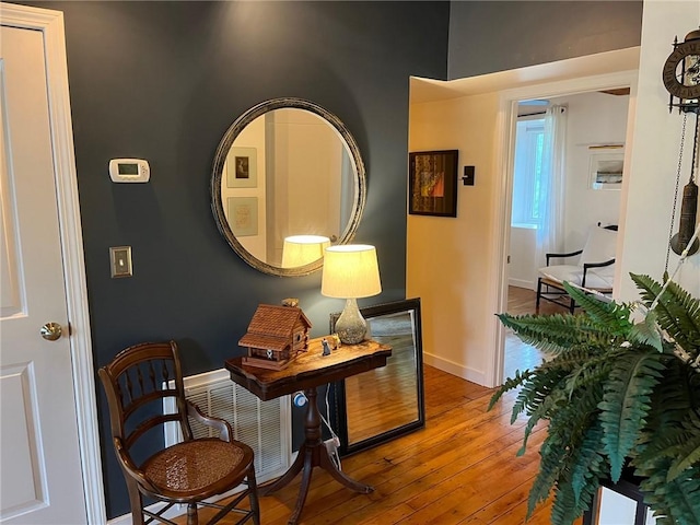 494 Woonasquatucket Ave Unit 304, North Providence, RI 02911 - sitting room featuring hardwood / wood-style floors and baseboards