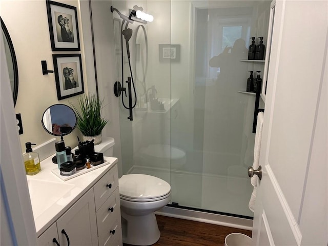 494 Woonasquatucket Ave Unit 304, North Providence, RI 02911 - full bath featuring vanity, a stall shower, and wood finished floors