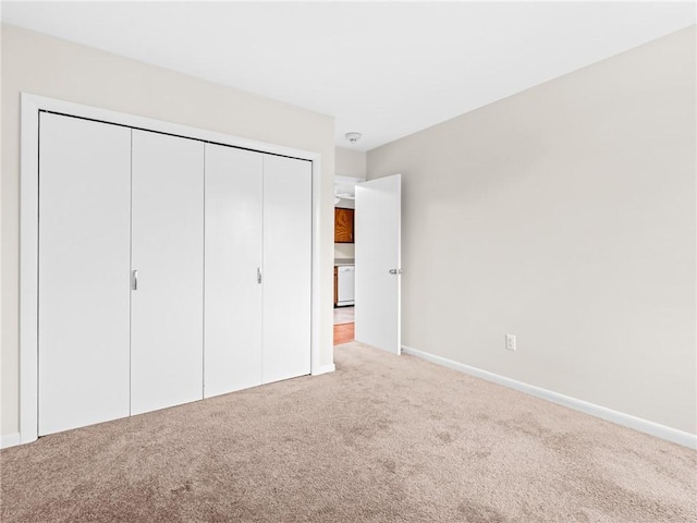 4430 Post Rd Unit 68E, Warwick, RI 02818 - unfurnished bedroom featuring carpet and a closet