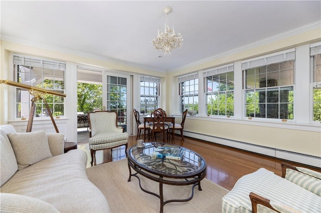 121 Avondale Rd, Westerly, RI 02891 - sunroom featuring a baseboard heating unit and a chandelier