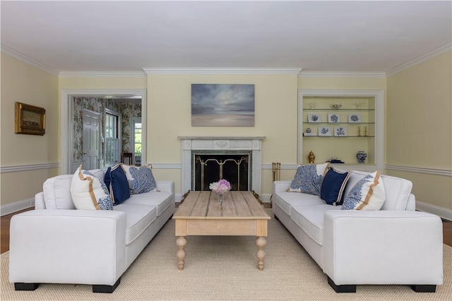 121 Avondale Rd, Westerly, RI 02891 - living area with crown molding, a high end fireplace, and built in features