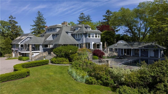 121 Avondale Rd, Westerly, RI 02891 - shingle-style home with a front lawn