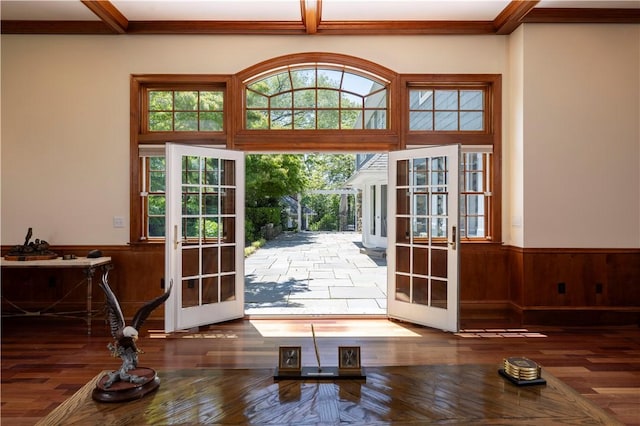 121 Avondale Rd, Westerly, RI 02891 - doorway with french doors, wainscoting, ornamental molding, wood finished floors, and wood walls