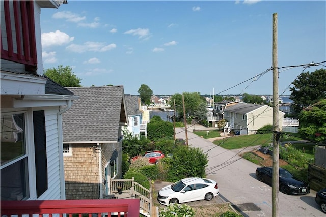 19 Remington St, Warwick, RI 02888 - exterior view of a shingled roof, a residential view, a downspout, and gutters