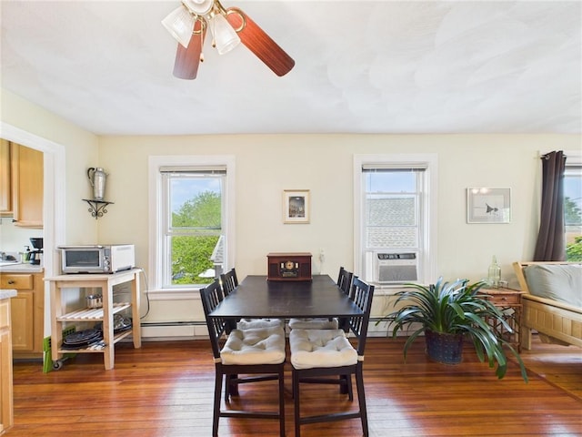 19 Remington St, Warwick, RI 02888 - dining area featuring healthy amount of natural light, wood-type flooring, a ceiling fan, and cooling unit