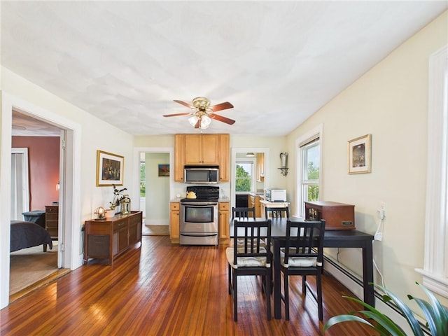 19 Remington St, Warwick, RI 02888 - dining area featuring dark wood-style flooring, healthy amount of natural light, and a ceiling fan