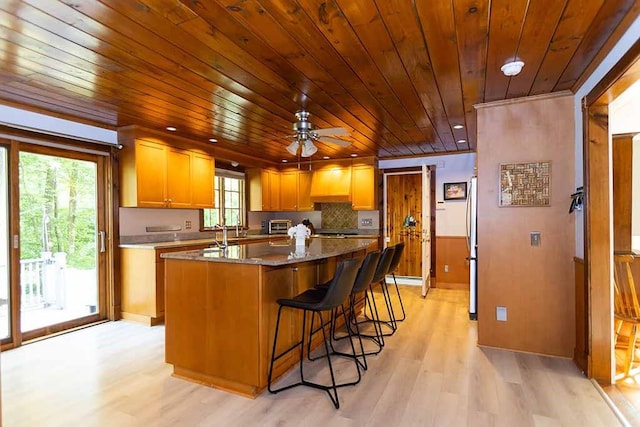 30 Karen Ann Dr, Smithfield, RI 02917 - kitchen featuring wood ceiling, a center island, light wood finished floors, custom exhaust hood, and a ceiling fan