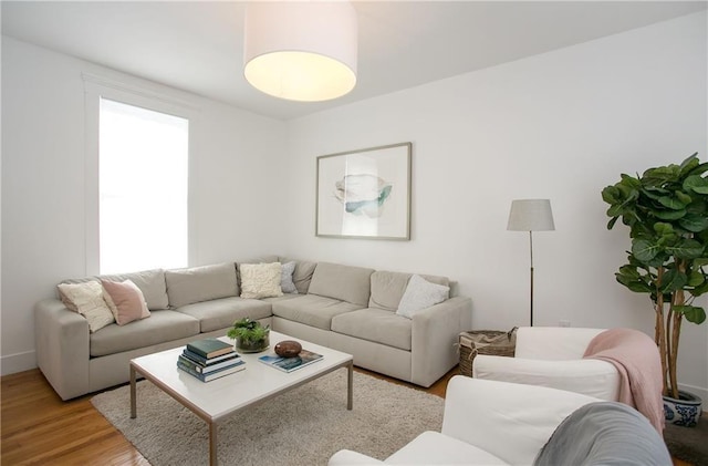 12 Poplar St, Newport, RI 02840 - living area featuring light wood-style flooring and baseboards