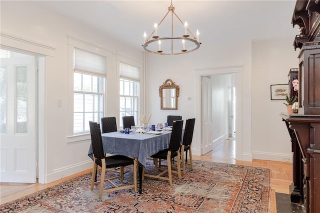 12 Poplar St, Newport, RI 02840 - dining room with a chandelier and baseboards