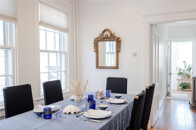 12 Poplar St, Newport, RI 02840 - dining area with wood finished floors and baseboards