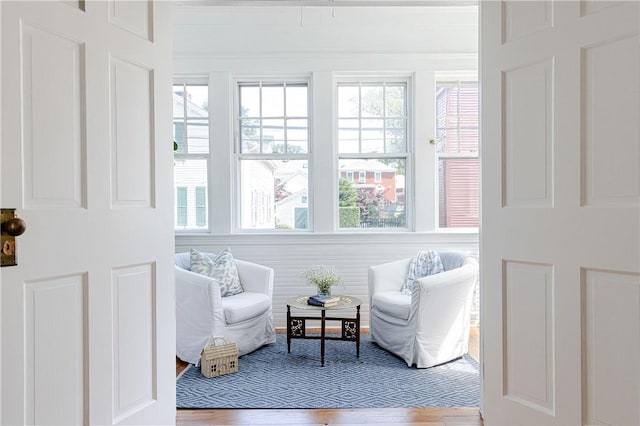 12 Poplar St, Newport, RI 02840 - living area featuring healthy amount of natural light and wood finished floors