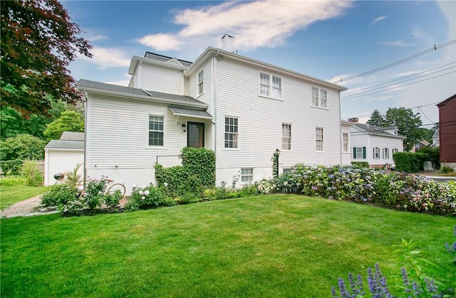 12 Poplar St, Newport, RI 02840 - rear view of house with a lawn