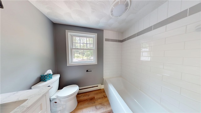 112 Cranberry Ridge Rd, Glocester, RI 02857 - bathroom featuring a baseboard heating unit, vanity, wood finished floors, and a tub to relax in