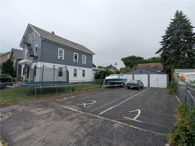 60 Sherman St, Pawtucket, RI 02860 - uncovered parking lot featuring a trampoline