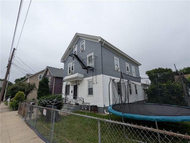 60 Sherman St, Pawtucket, RI 02860 - view of home's exterior with a trampoline