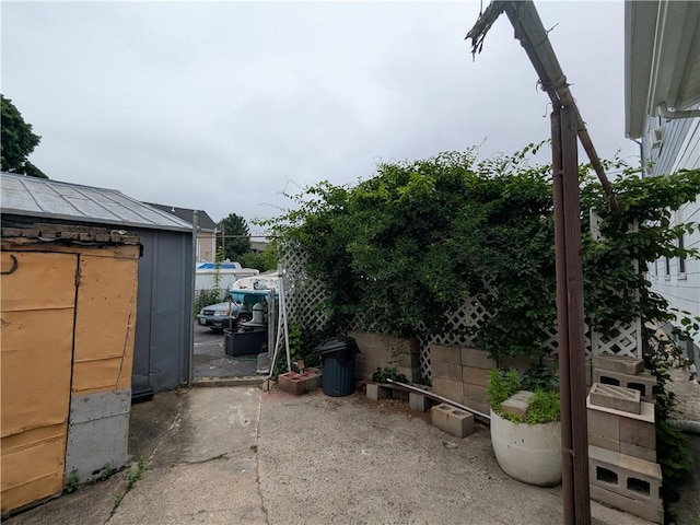 60 Sherman St, Pawtucket, RI 02860 - view of patio with a storage shed