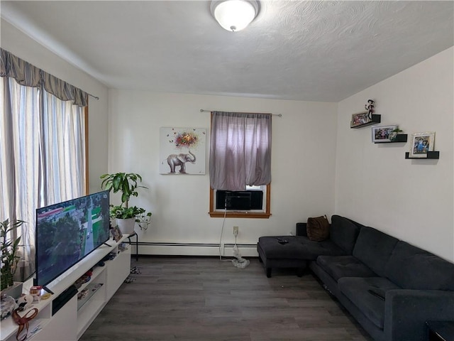 60 Sherman St, Pawtucket, RI 02860 - living area featuring baseboard heating, wood finished floors, and cooling unit
